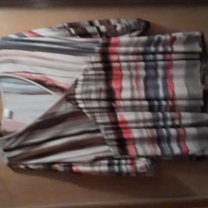 3XL top with V neck. The top is tan brown and orange strpes and horizontal lines